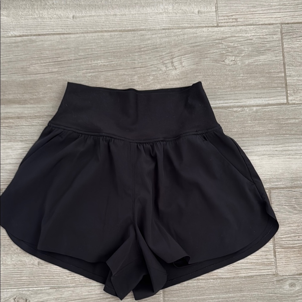 Black Athletic Shorts with High-Waisted Design and Scalloped Edges with Pockets